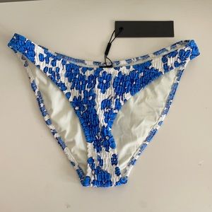 TRIANGL blue and white flower bikini bottoms.